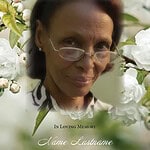 Memorial portrait of Dame Lastname with floral background for obituary.