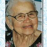 Elderly woman smiling, obituary photo for Felicita Gamero.