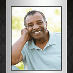 Memorial obituary card featuring a smiling man in a light blue shirt.