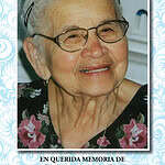 Elderly woman with glasses smiling, memorial photo for Felicita Gamero.