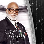 Formal obituary memorial card with a distinguished man in a suit.