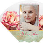 Memorial card with roses and a photo of a smiling elderly woman.