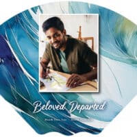 Memorial card with a photo of a smiling man and ocean wave design.