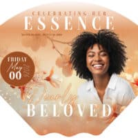 Memorial card for a beloved woman with floral design and joyful expression.
